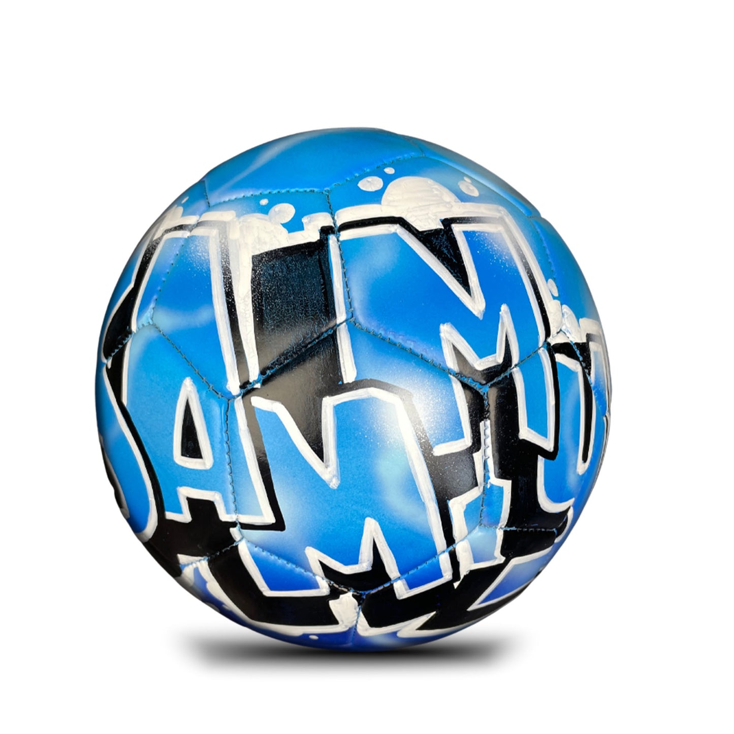 A blue and black soccer ball with the word "ALMO" painted on it.