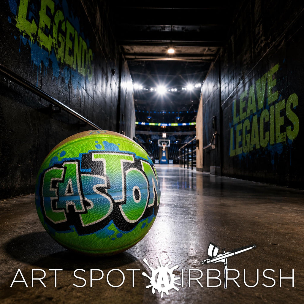 A basketball with the word "EASTON" painted on it, sitting on a concrete floor in a dimly lit hallway with graffiti on the walls.