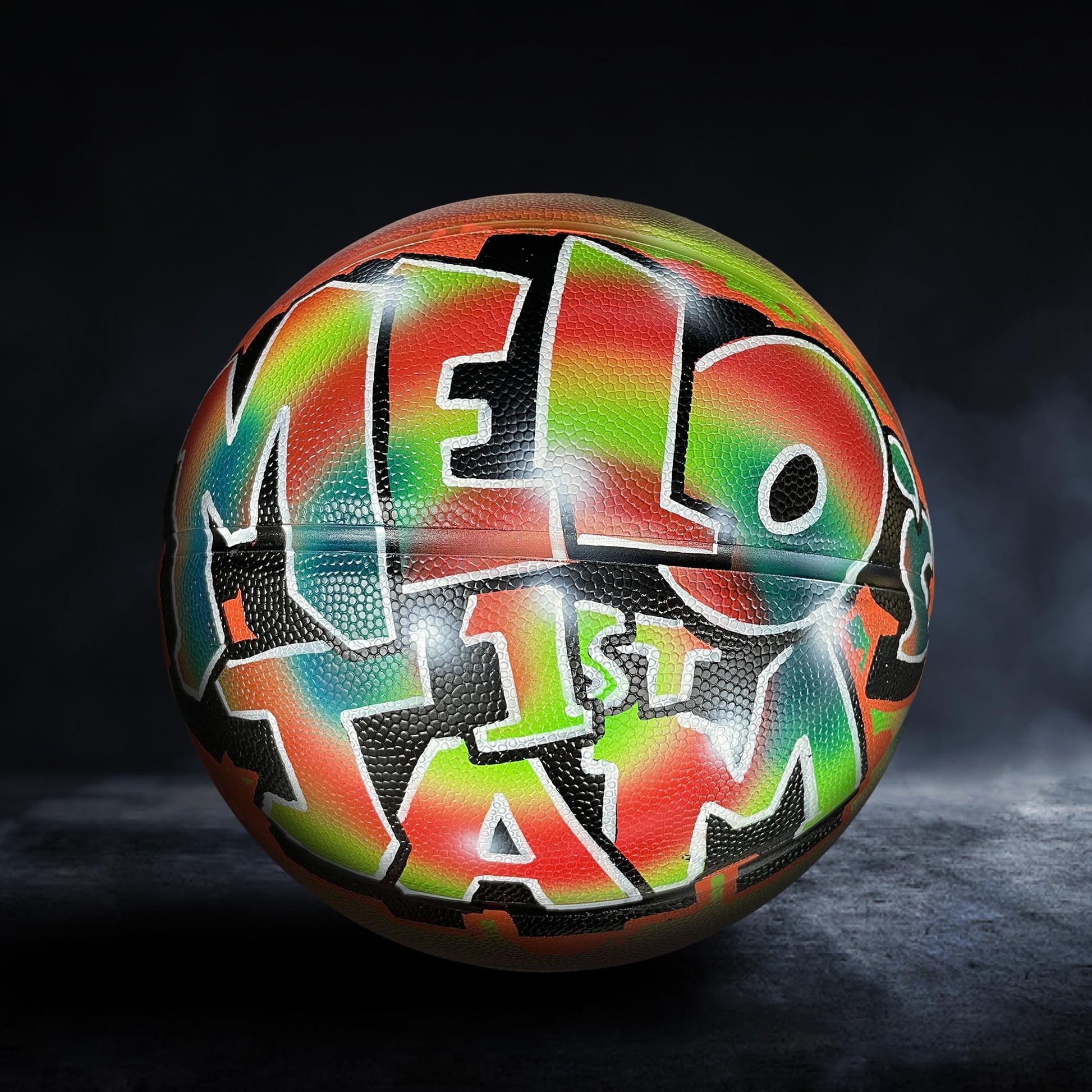 A colorful basketball with the word "MELO" painted on it.
