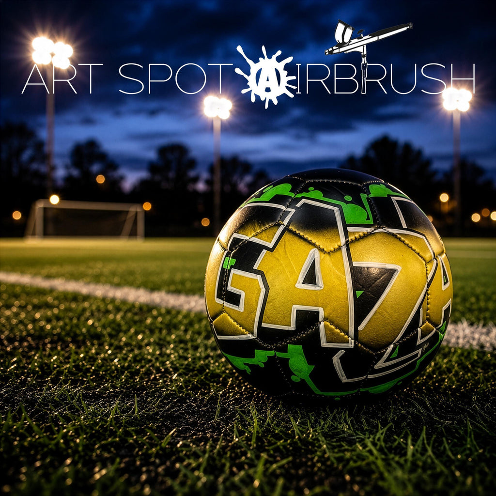 a soccer ball with the word "Gaz" on it, placed on a grassy field at night with floodlights illuminating the area.