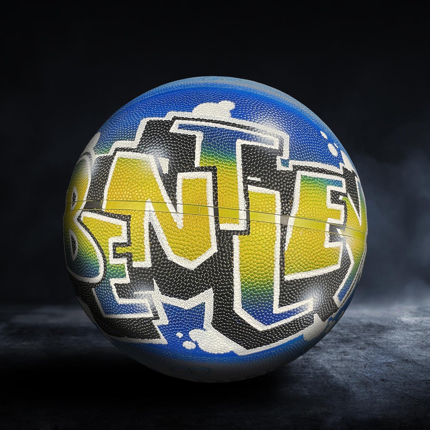 A basketball with a colorful, graffiti-style design on it, featuring the word "BENTLEN" prominently displayed.