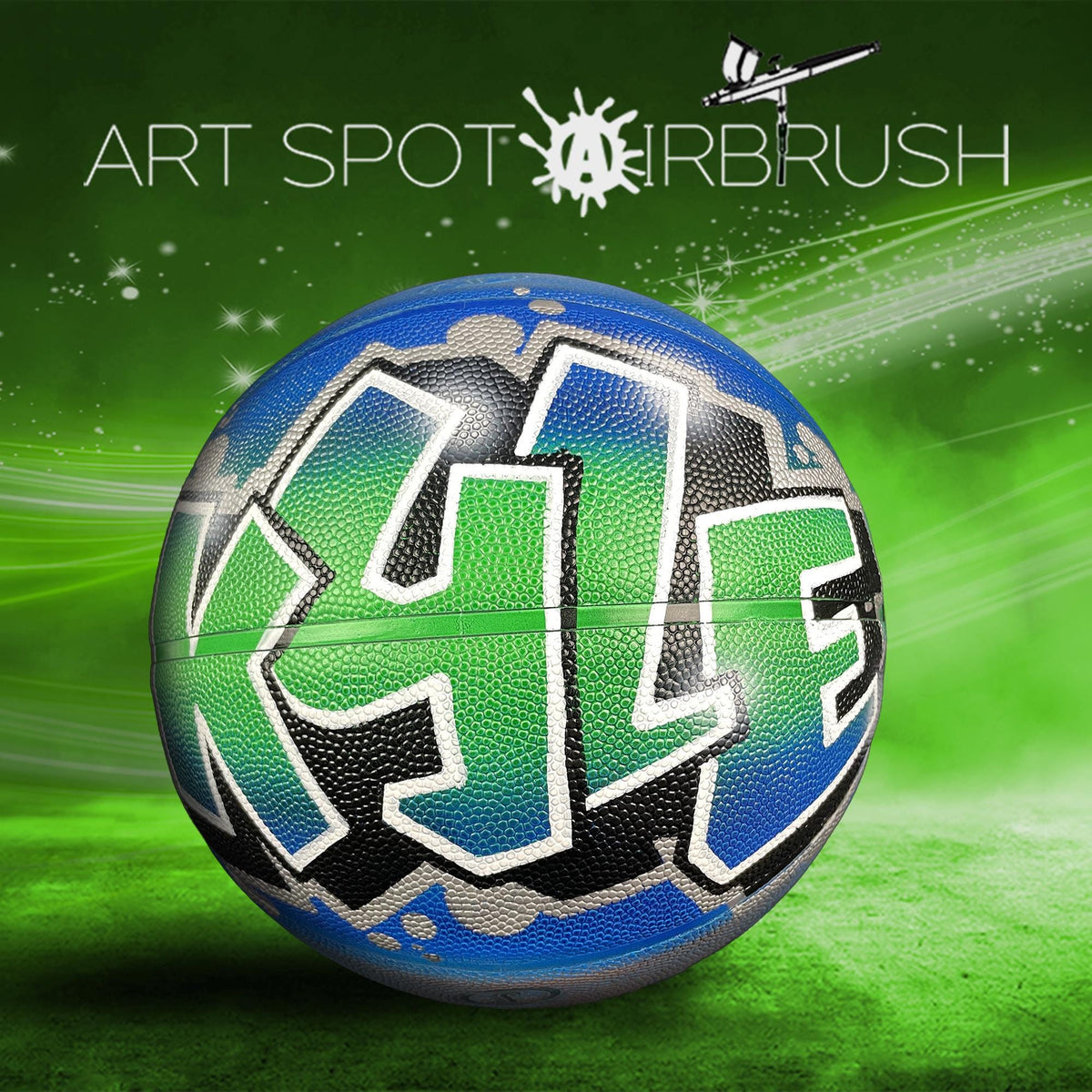 a basketball with a colorful, graffiti-style design on it, set against a green background with a white and black logo.