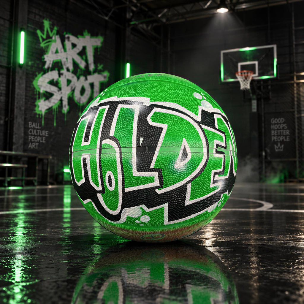A green basketball with the word "HIDE" painted on it, sitting on a basketball court with graffiti on the walls in the background.