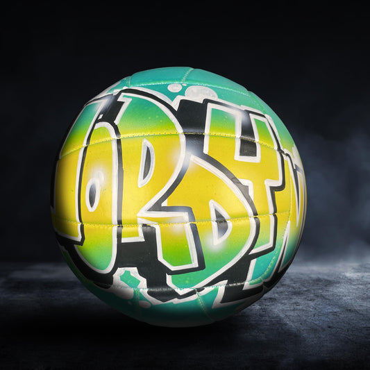 A colorful sports ball with the word "LORRY" painted on it, set against a dark background.