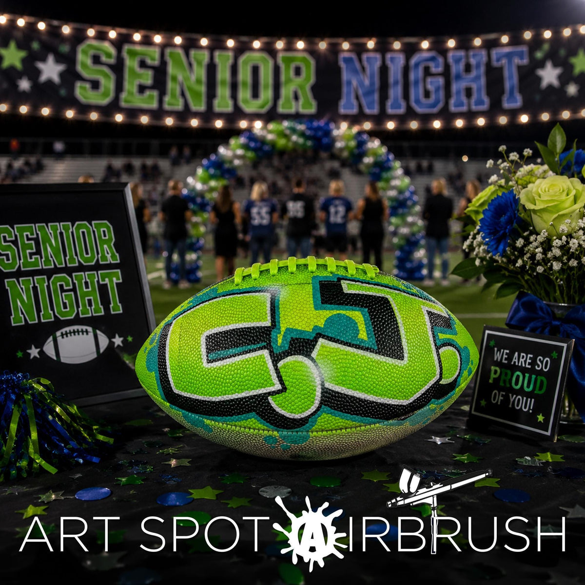 a decorated football with a large "C" on it, surrounded by decorations and a sign that reads "SENIOR NIGHT".