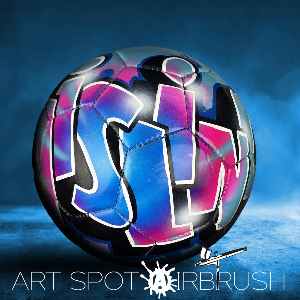 A colorful, graffiti-style soccer ball with the text "ART SPOT AIRBRUSH" displayed on it.