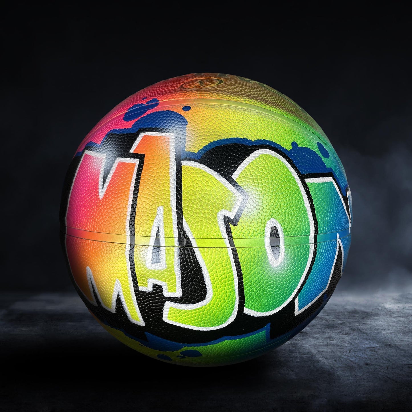 A colorful basketball with the name "Mason" painted on it.