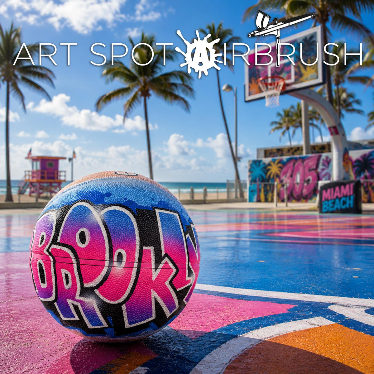 a basketball court with a basketball on top of it, surrounded by palm trees and a beach in the background.
