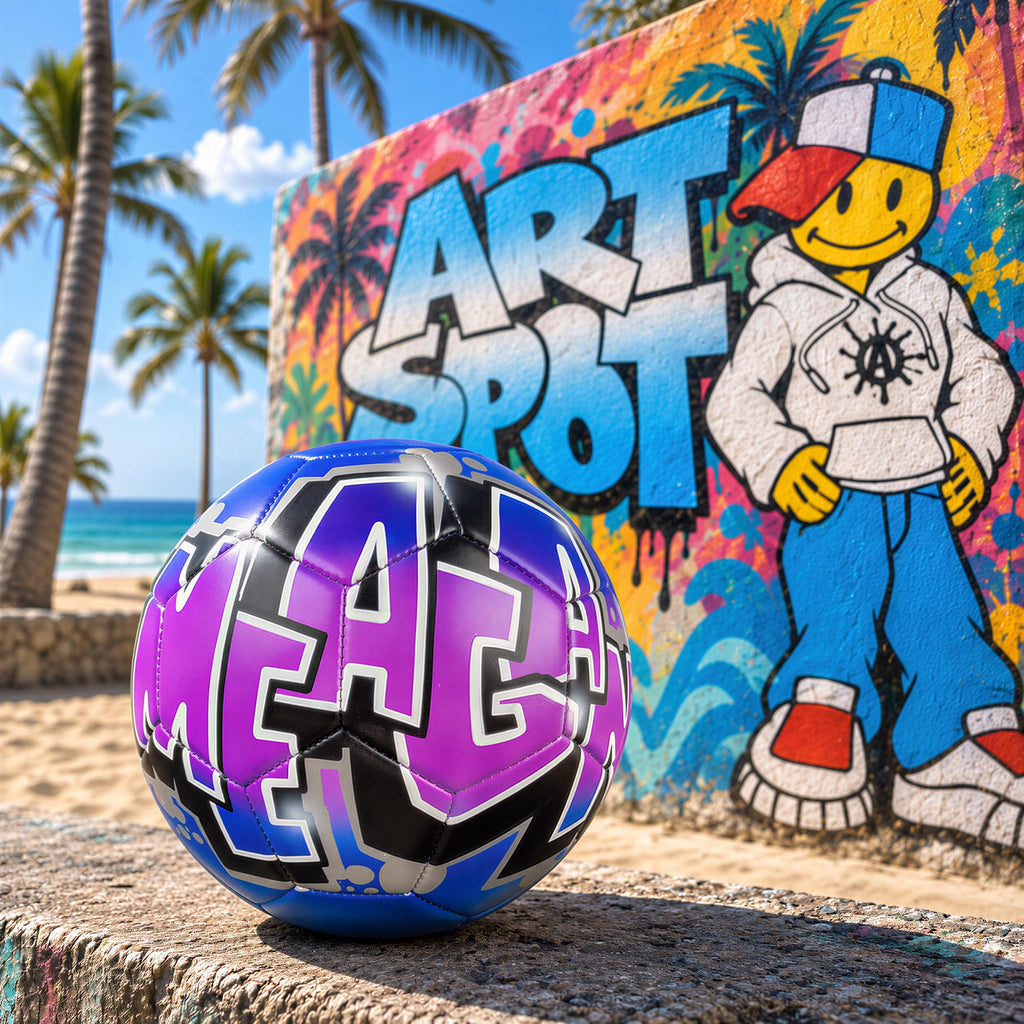 A colorful graffiti mural on a wall, featuring a cartoon character and the word "ART SPOT" prominently displayed. In the foreground, there is a purple and black soccer ball with the word "LAC" written on it.